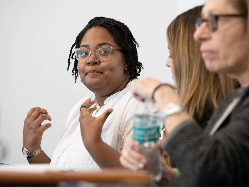 Black woman speaking on an employer panel